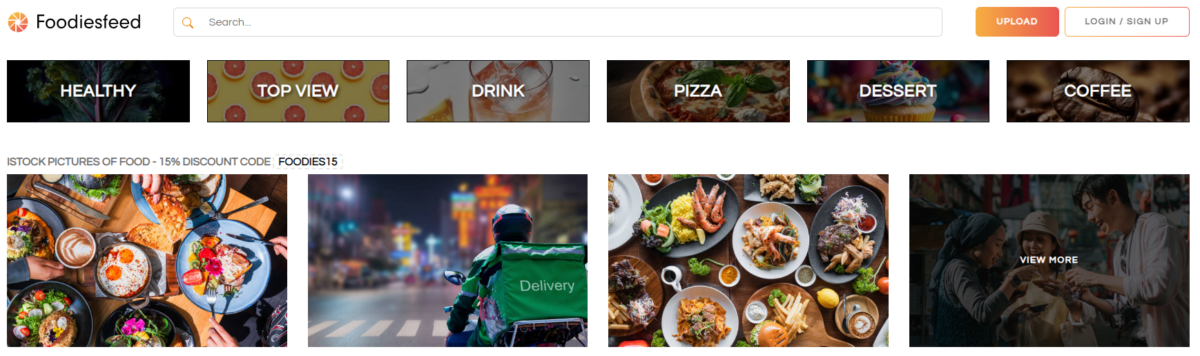 FoodiesFeed homepage screenshot showcasing mouth-watering food photography for restaurant websites and food blogs.